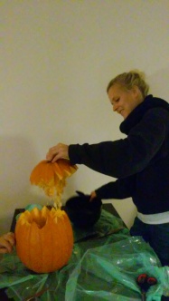 Cathrine carving her pumpkin!